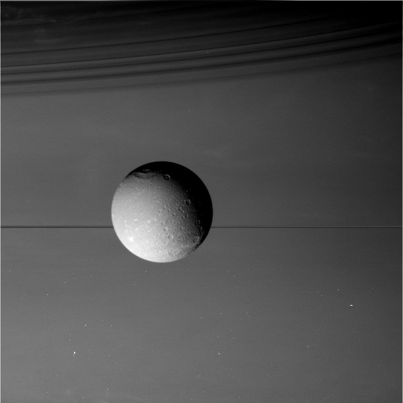 Illustration for article titled Farewell, Dione: Cassini Makes Final Flyby of Saturn's Fourth Largest Moon